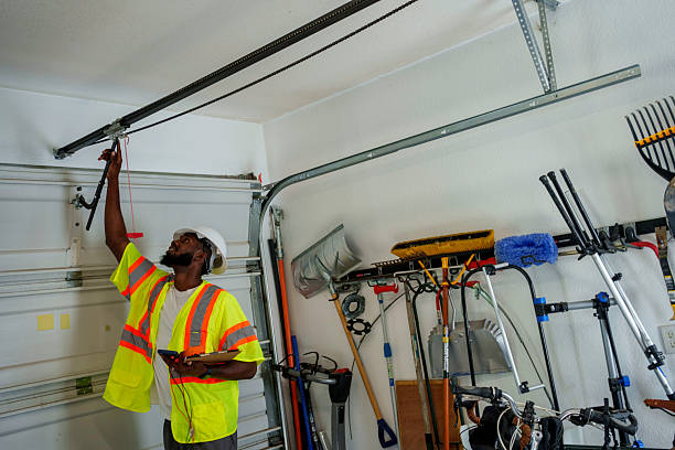 Professional Garage Door Panel Replacement technician working in Apalachin, NY
